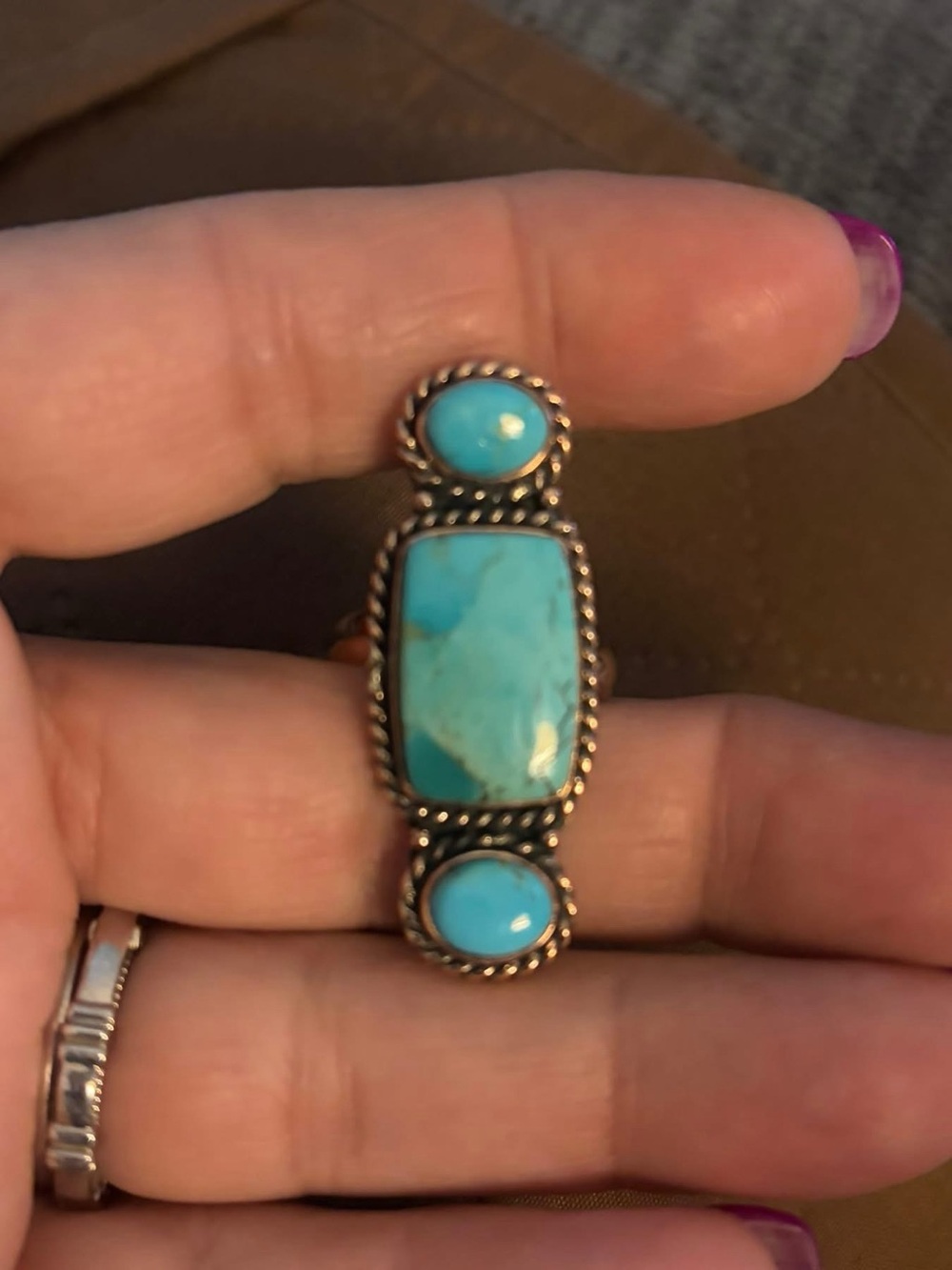 Nice turquoise adjustable copper ring.